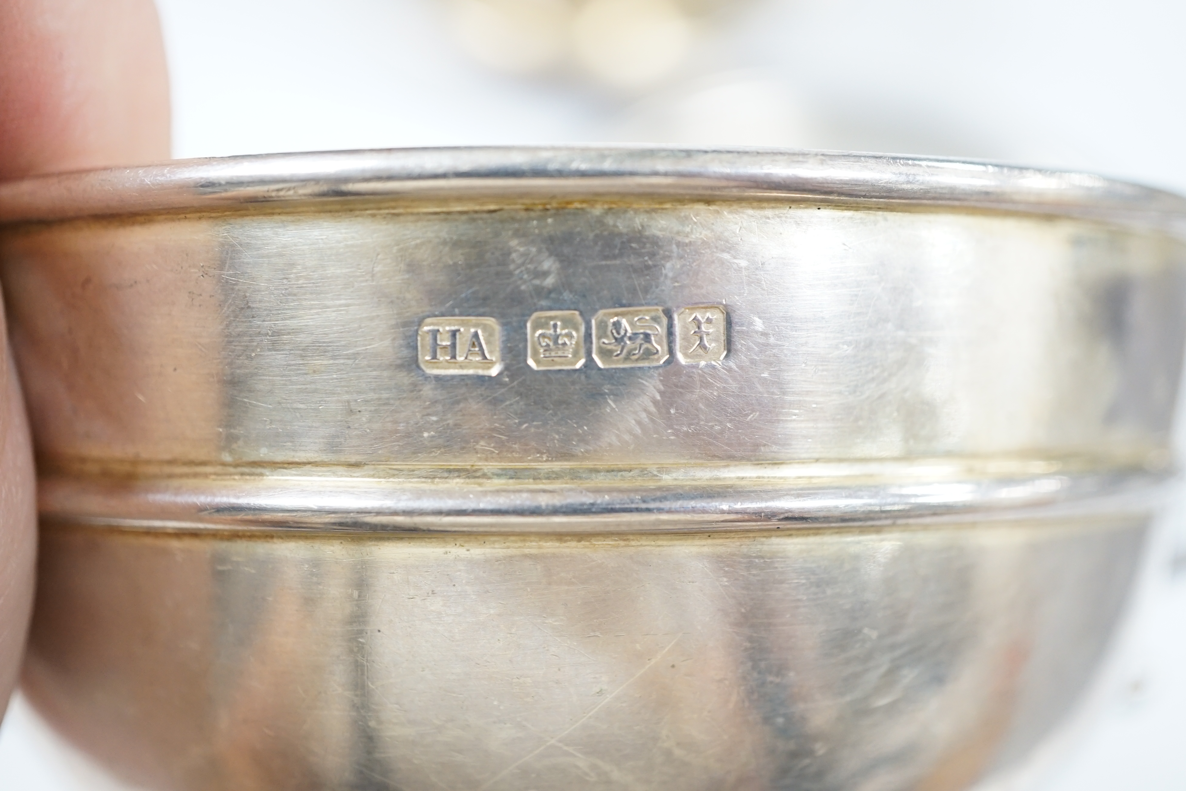 An Edwardian silver porringer on stand, Sheffield, 1901 and a late silver porringer on stand, 12.9oz. Condition - poor to fair